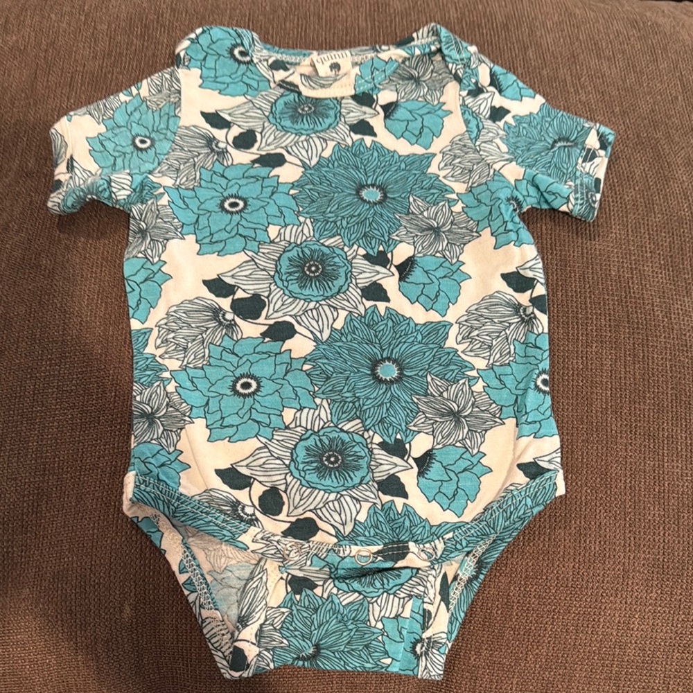 Kate Quinn Blue and White Bodysuit with Whimsical Print
